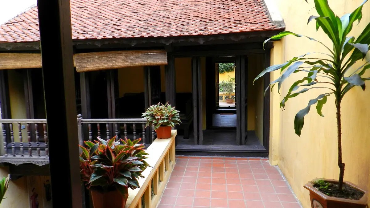 87 Ma May Heritage House, Hanoi Old Quarter Inner courtyard and wooden rooms of the 87 Ma May heritage tube house in the Hanoi Old Quarter