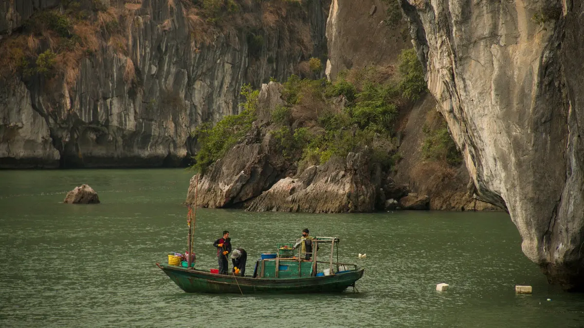 Islands of Bai Tu Long Bay Karst islands and calm water in Bai Tu Long Bay