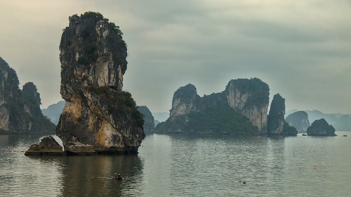 Bai Tu Long Bay Scenery Calm sheltered water among karsts in Bai Tu Long Bay