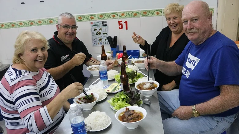 Bún chả dinner on the Hanoi Vespa food tour