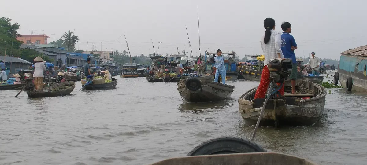 Boats trading fruit and vegetables at the floating market in Can Tho