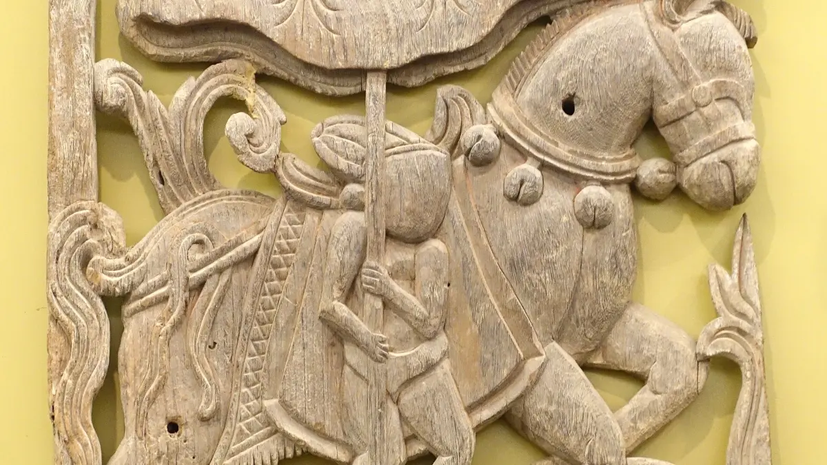 Carved Wooden Panel, Vietnam National Fine Arts Museum Carved wooden panel with figures and animals in the Vietnam National Fine Arts Museum, Hanoi