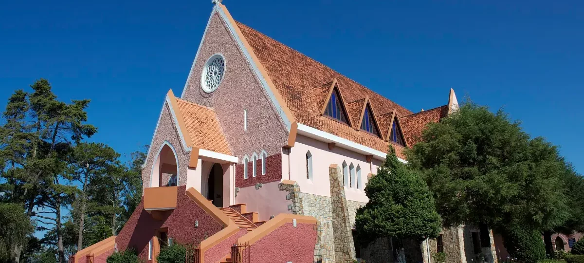 Pink Domaine de Marie Church on a hill in Dalat