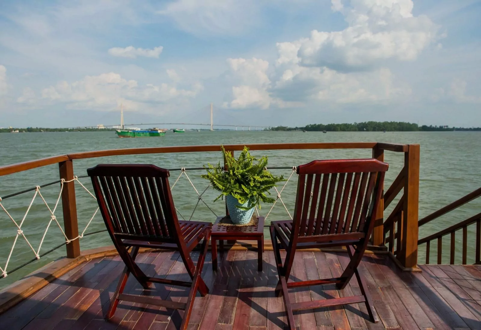 Deck chairs facing the river on the Dragon Eyes