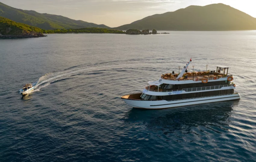 Aerial view of Emperor Cruises Legend with its tender speedboat in Nha Trang Bay