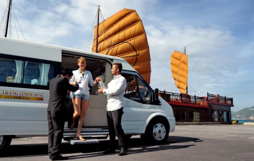 Emperor Cruises crew welcoming guests from the hotel transfer van at the Nha Trang pier