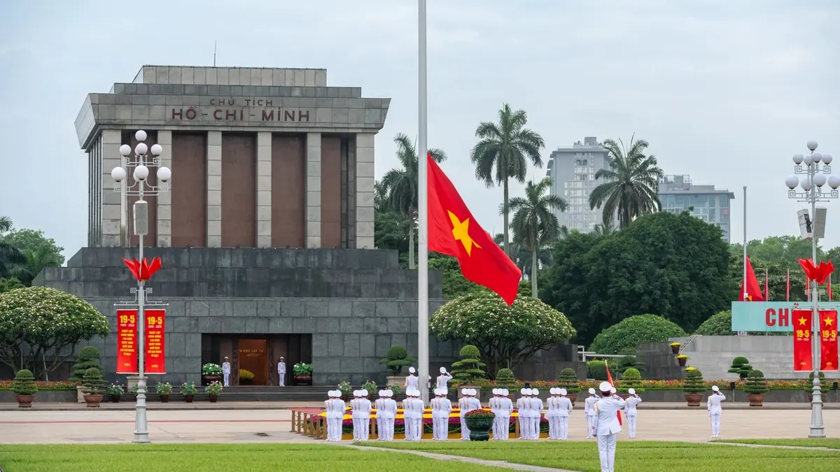 Honour guard raising the national flag in front of Ho Chi Minh Mausoleum on Ba Dinh Square, Hanoi