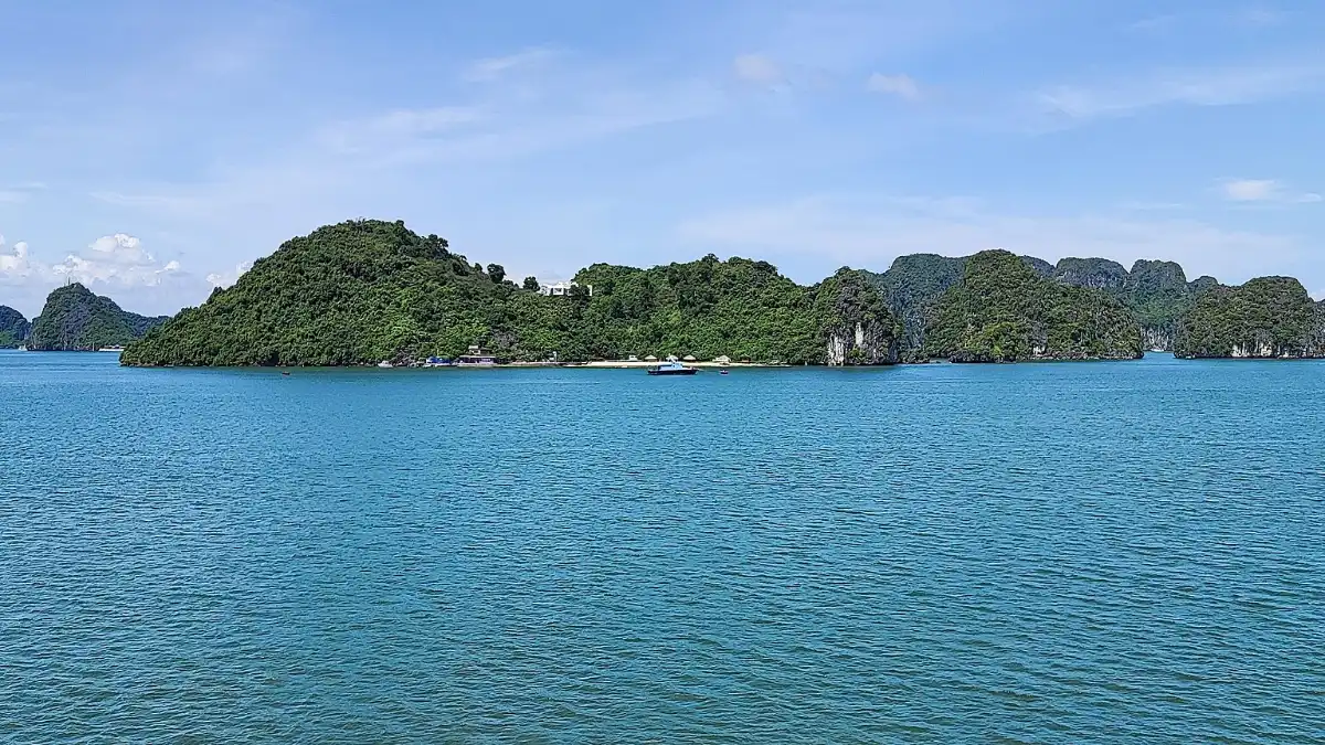 Boats among the Karsts of Halong Bay Boats sailing among limestone karsts in Halong Bay
