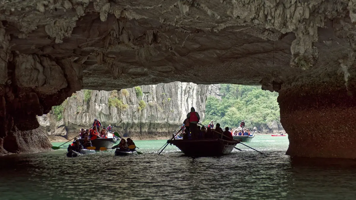 Luon Cave (Hang Luon), Halong Bay Low arch of Luon Cave leading into an enclosed lagoon in Halong Bay