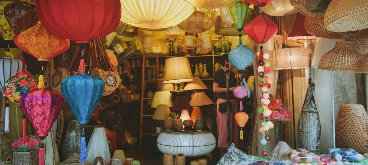 Colourful silk lanterns, lamps and rattan handicrafts for sale in a souvenir shop in Hanoi