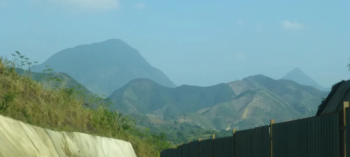 Noi Bai–Lao Cai expressway winding towards green mountains on the road from Hanoi to Sapa