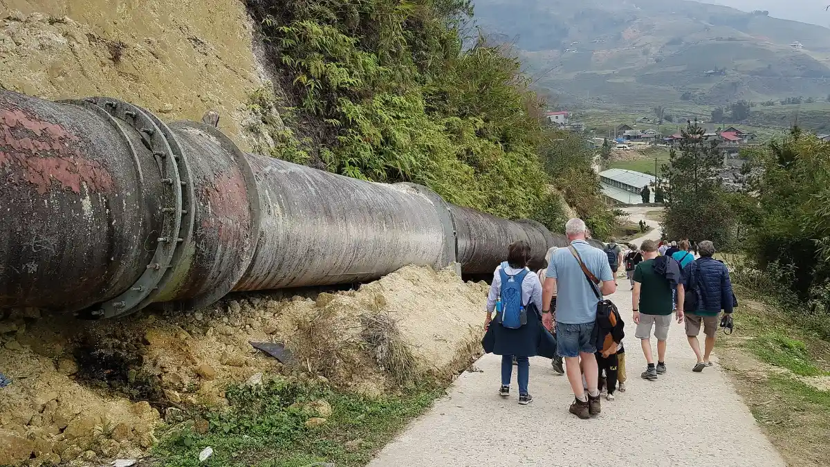Hikers on the Trail to Ta Van, Sapa Group of hikers on the trail to Ta Van village in the Muong Hoa valley, Sapa