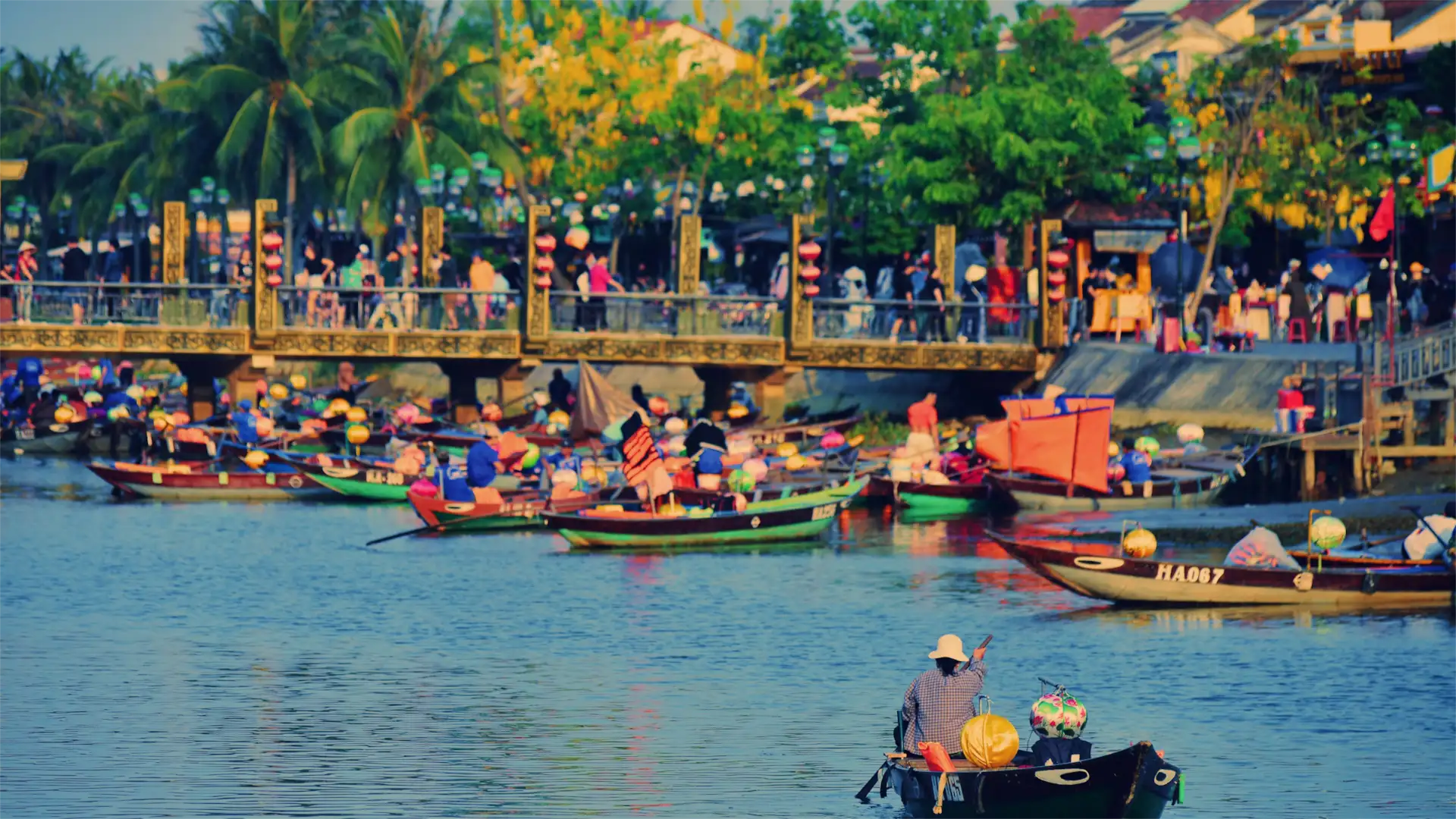 Boats on the Thu Bon River in front of Hoi An Ancient Town, Vietnam