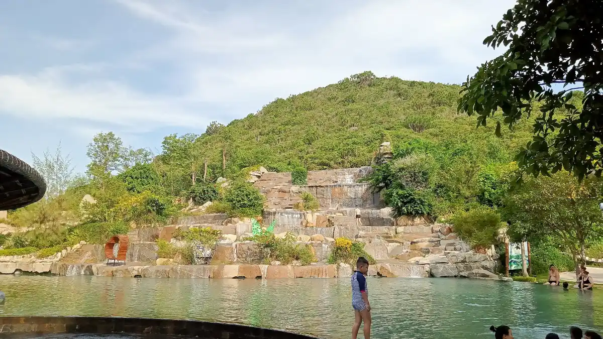 Hon Tam Island Coast, Nha Trang Green hillside and rocky coast on Hon Tam Island, Nha Trang