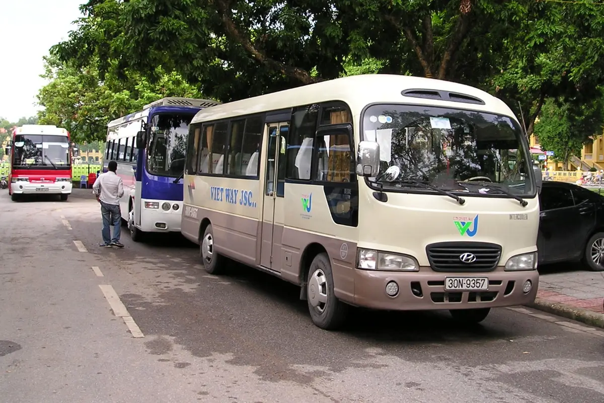 Hyundai County 29-seat tourist coach on a street in Hanoi, Vietnam
