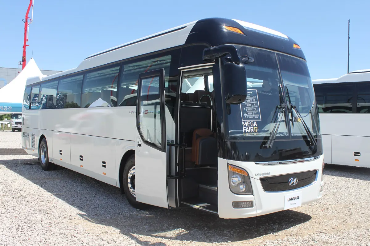 White Hyundai Universe 45-seat coach with the front door open
