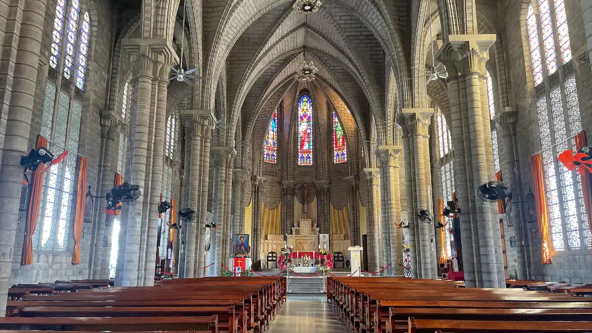 Nave and stained glass inside Nha Trang Cathedral