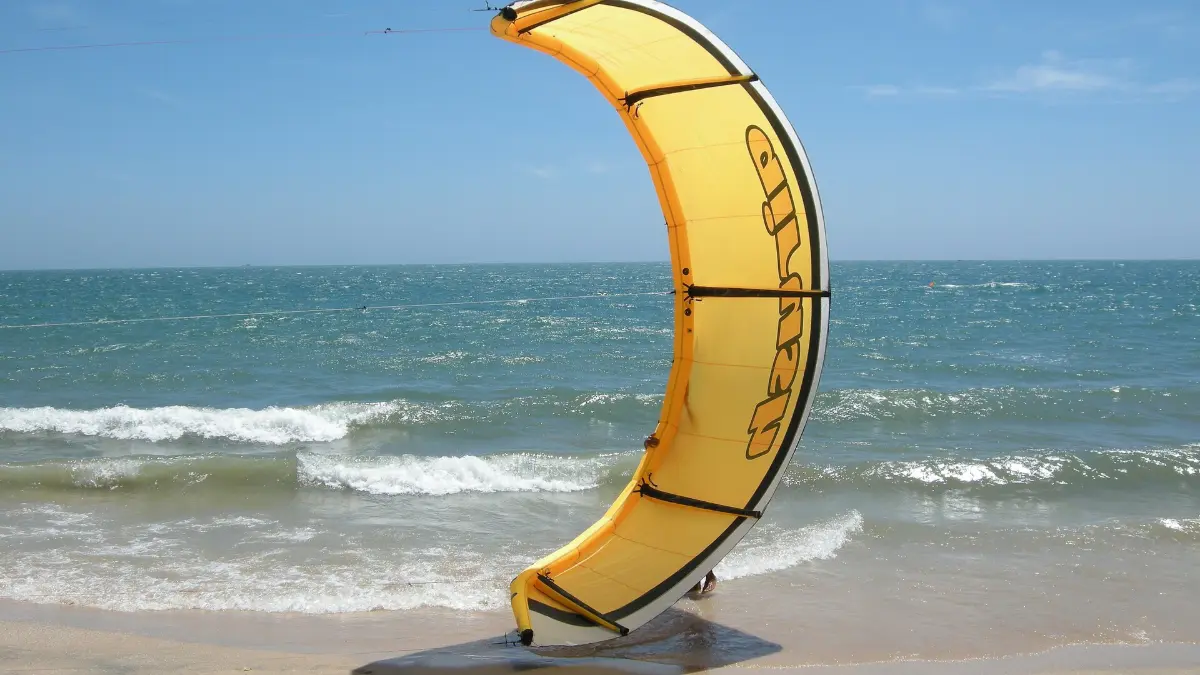 Kiteboarding in Mui Ne Kiteboarder riding the waves in Mui Ne