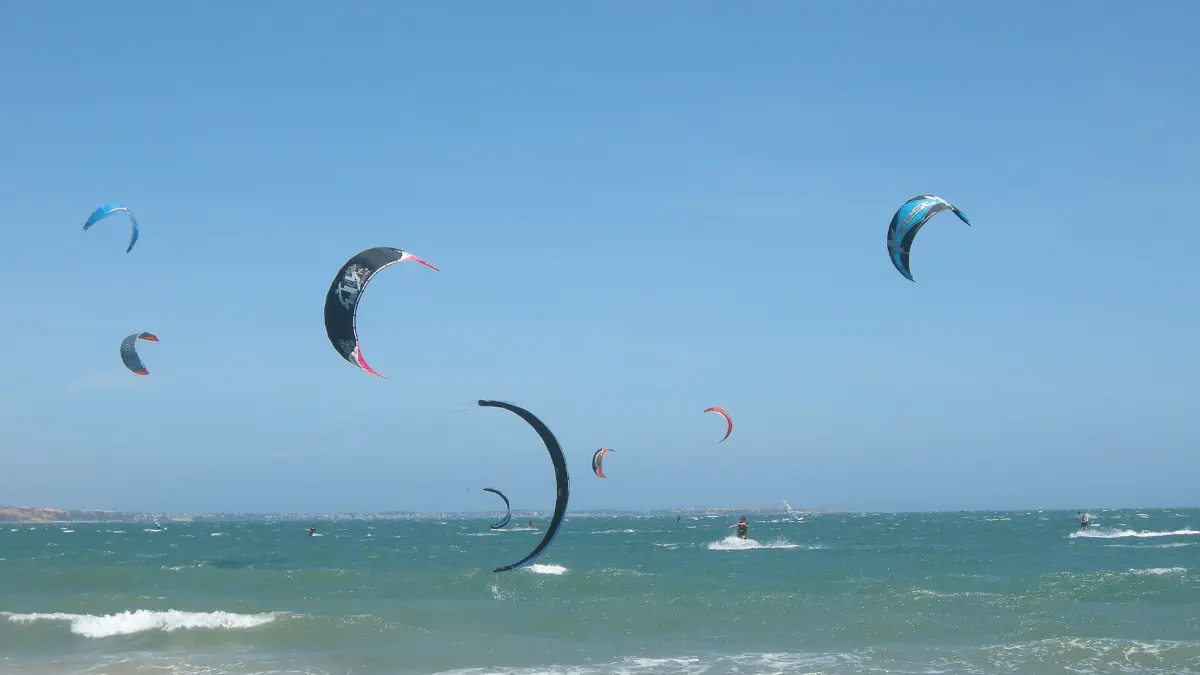 Kitesurfing on Mui Ne Beach Kitesurfer on the sea off Mui Ne beach
