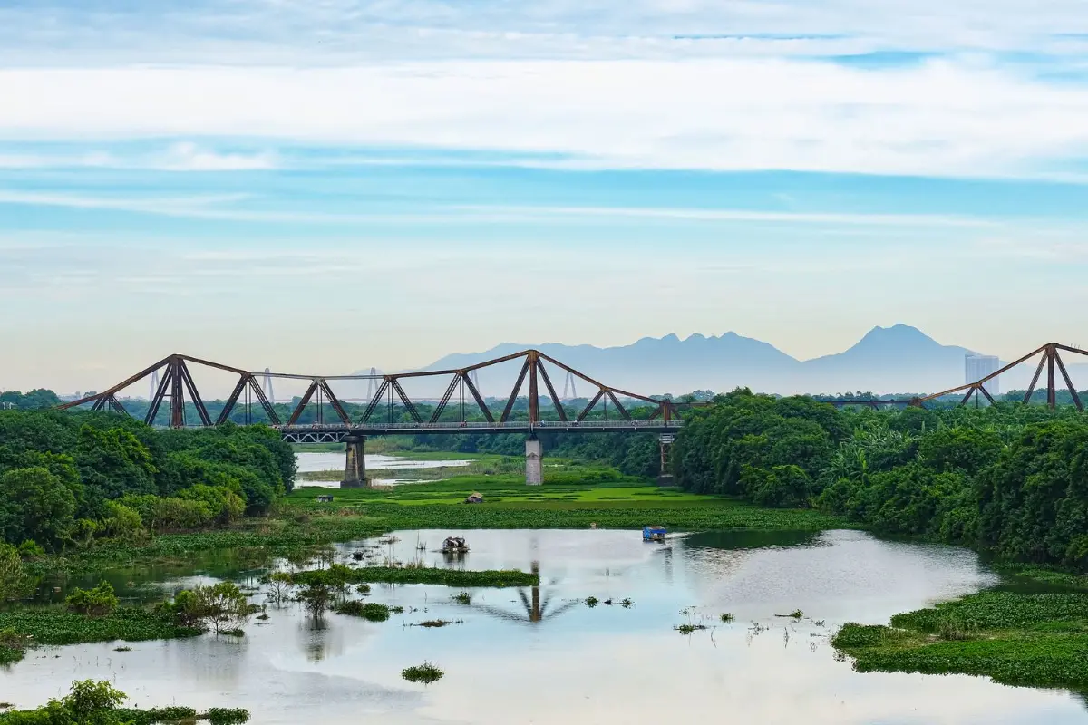 Historic Long Bien Bridge crossing the Red River in Hanoi