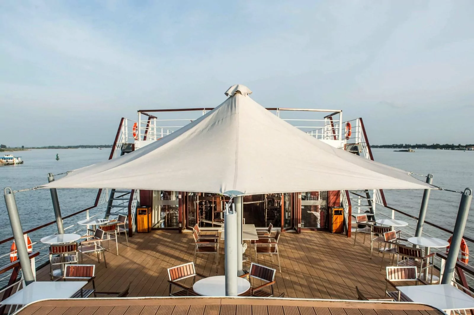 Dining area of the Mekong Eyes Explorer with river views