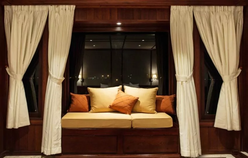Upper Deck Suite with day bed and balcony on the Mekong Eyes Explorer