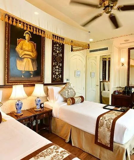 Colonial-style suite interior on the Mekong Princess