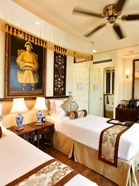 Colonial-style suite interior on the Mekong Princess