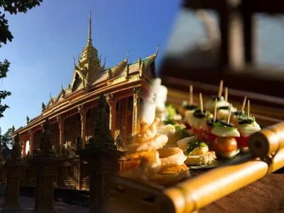 Khmer pagoda visit and a snack on board a Mystic sampan