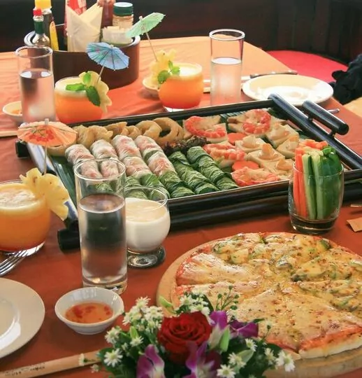 Snack table set for four on a Mystic sampan