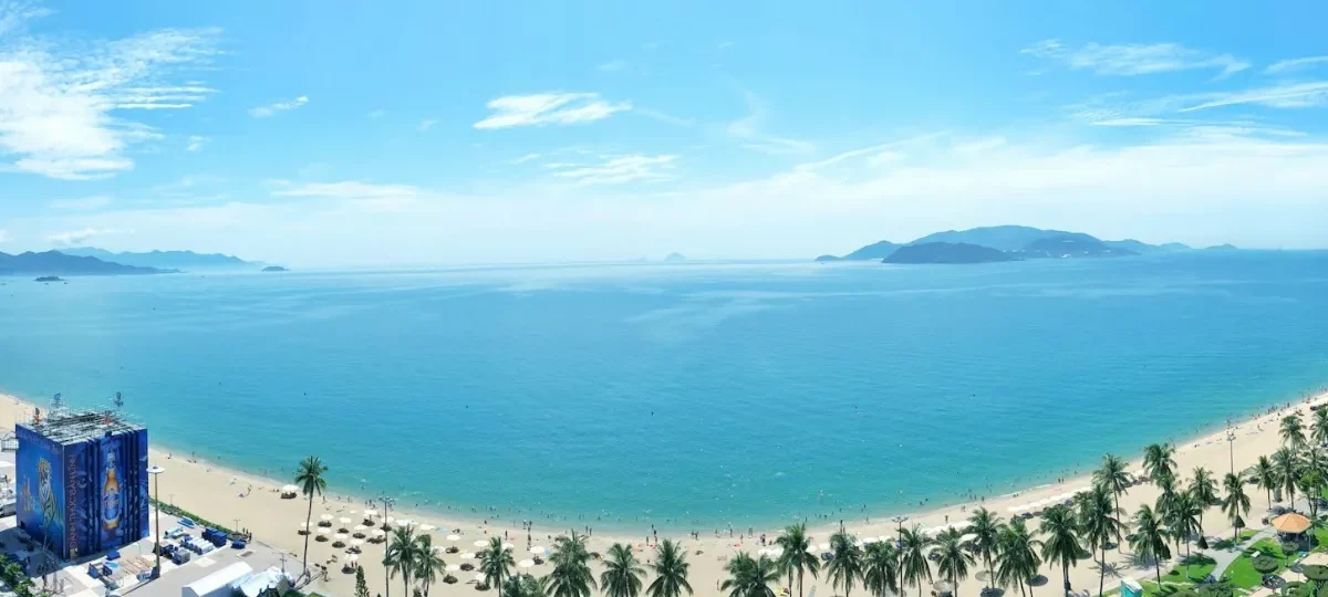 Aerial view of the palm-lined Tran Phu beachfront and turquoise Nha Trang Bay, the most popular area to stay