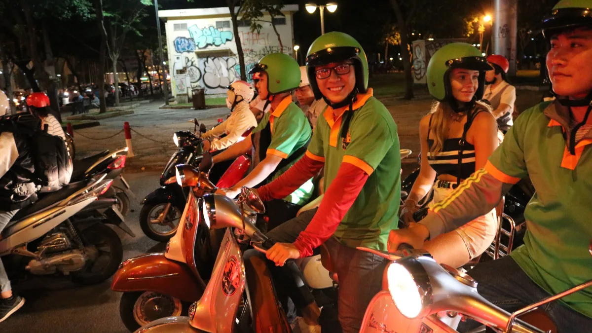 Saigon After Dark Street Food & Live Music Tour by Vintage Vespa