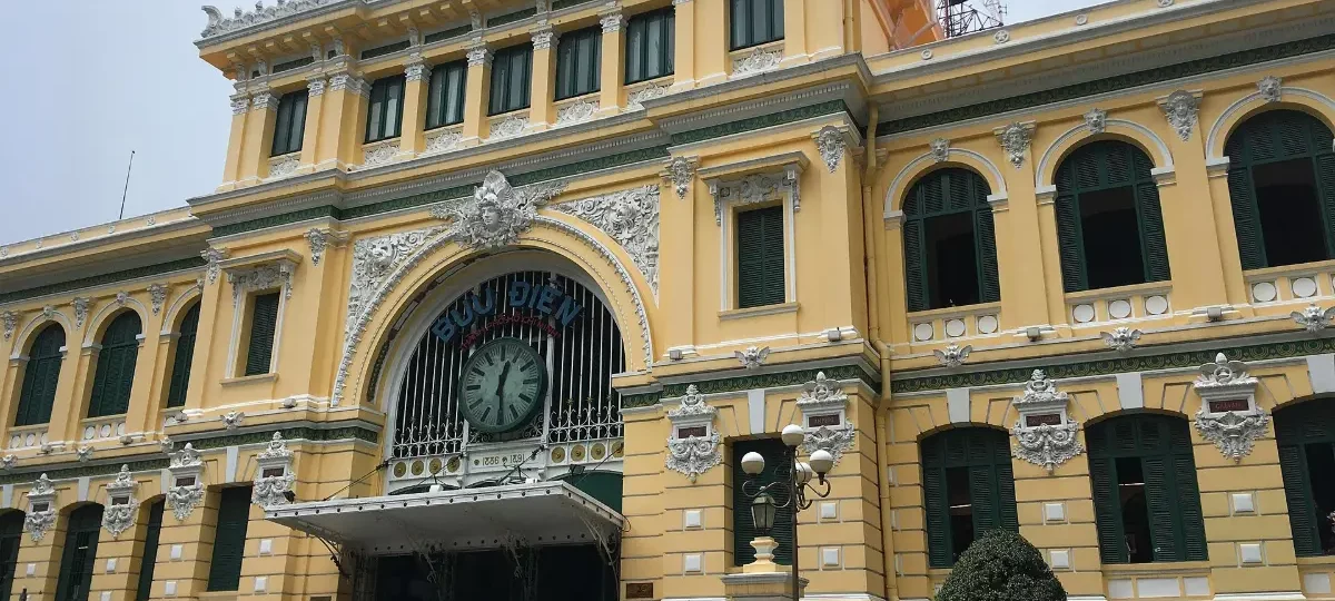 Yellow French-colonial facade of the Saigon Central Post Office, Ho Chi Minh City