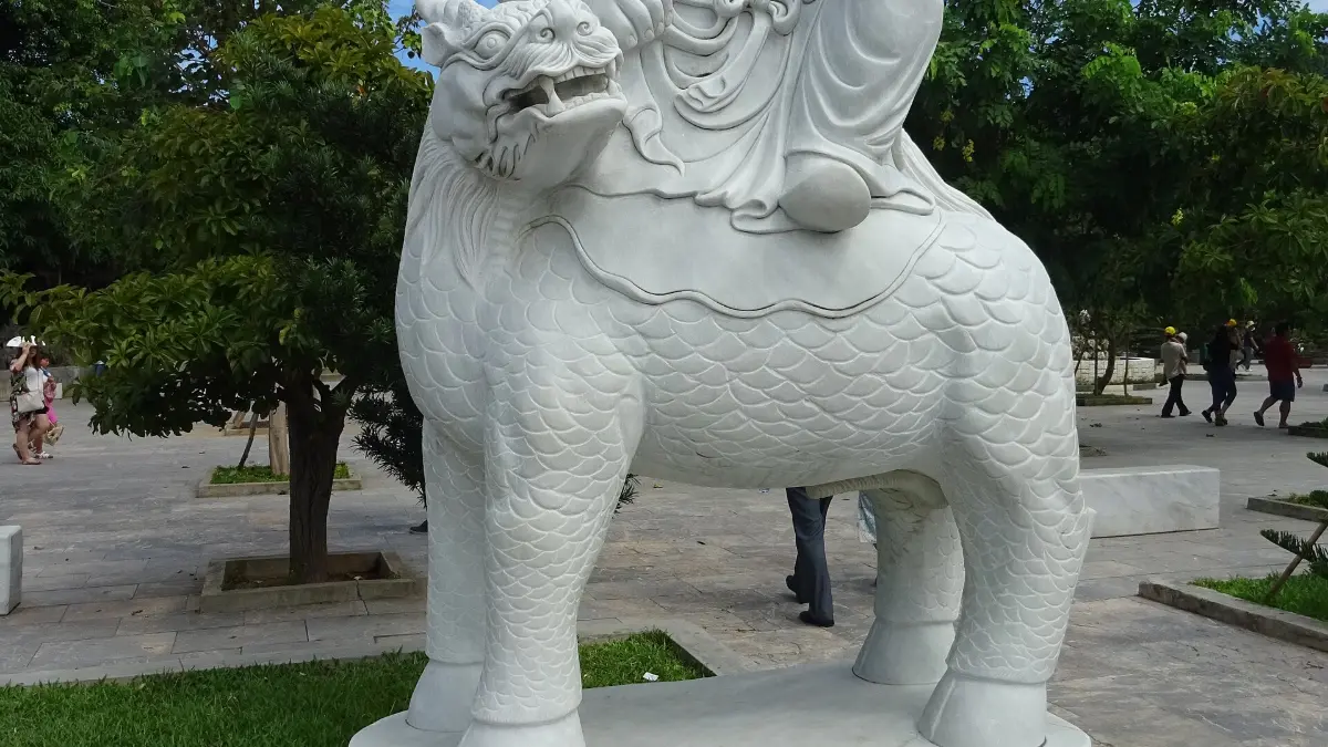 Stone Lion at Linh Ung Pagoda, Son Tra White marble guardian lion in the grounds of Linh Ung Pagoda, Son Tra, Da Nang