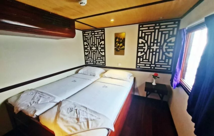 Double cabin with Cambodian teak and lattice panels on the Toum Tiou II