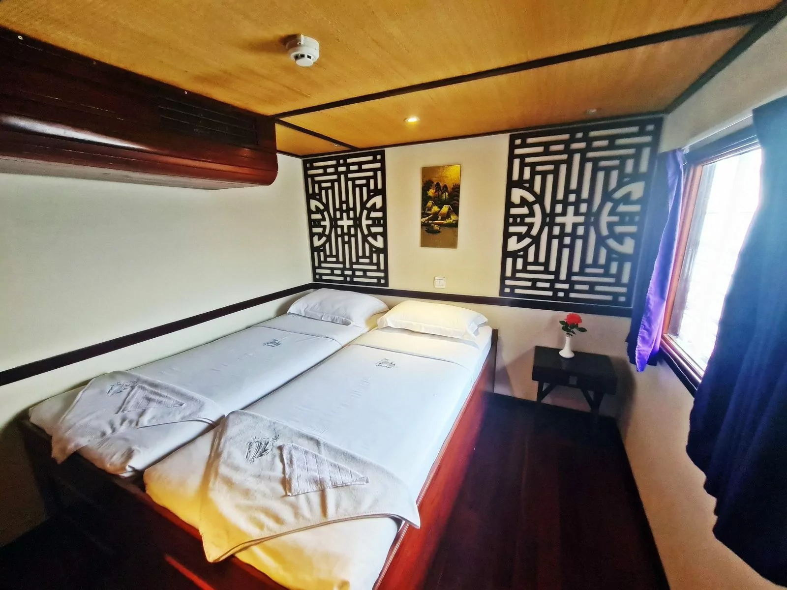 Double cabin with Cambodian teak and lattice panels on the Toum Tiou II