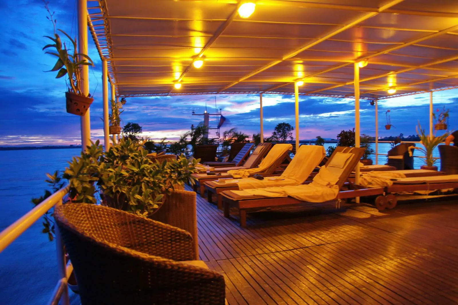 Sun deck lounge lit up in the evening on the Toum Tiou II