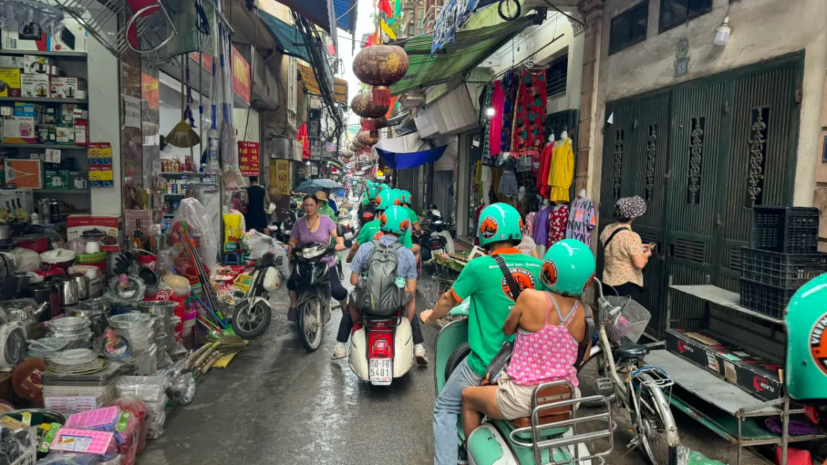 Vespa ride through an Old Quarter street