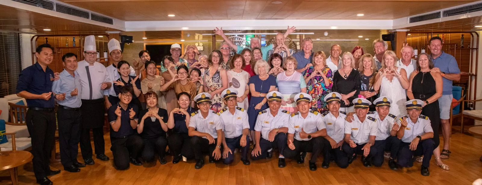 Victoria Mekong Cruises crew and guests together on board
