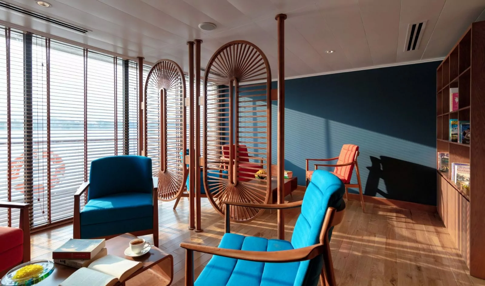 Library and games room with armchairs