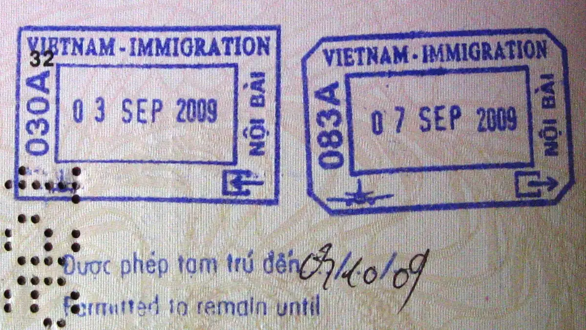 Vietnam Immigration entry and exit stamps from Noi Bai Airport in a passport, with the permitted stay date