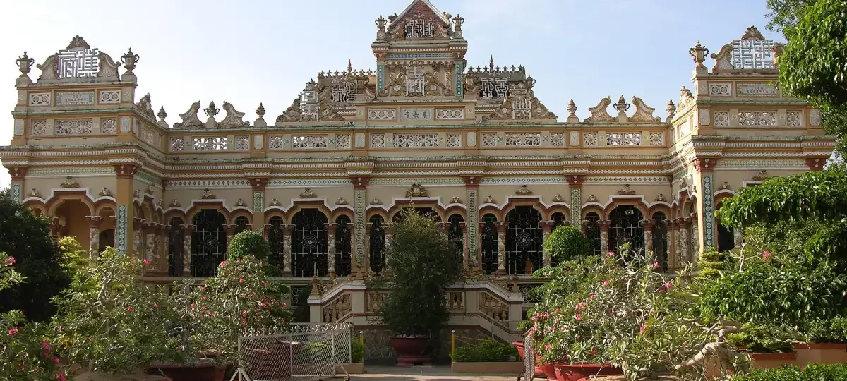 Ornate facade of Vinh Trang Pagoda in My Tho, Tien Giang