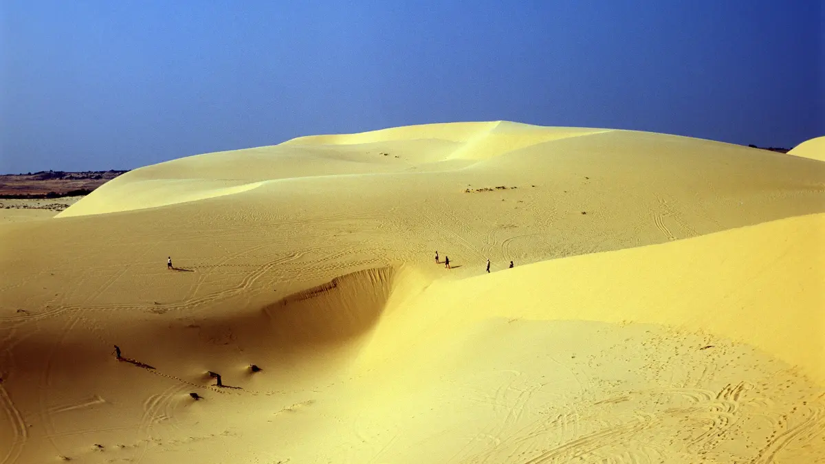 White Dune near Mui Ne Rolling white sand dune under a blue sky near Mui Ne